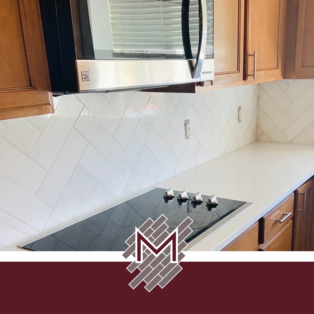 Herringbone backsplash tile and fireplace