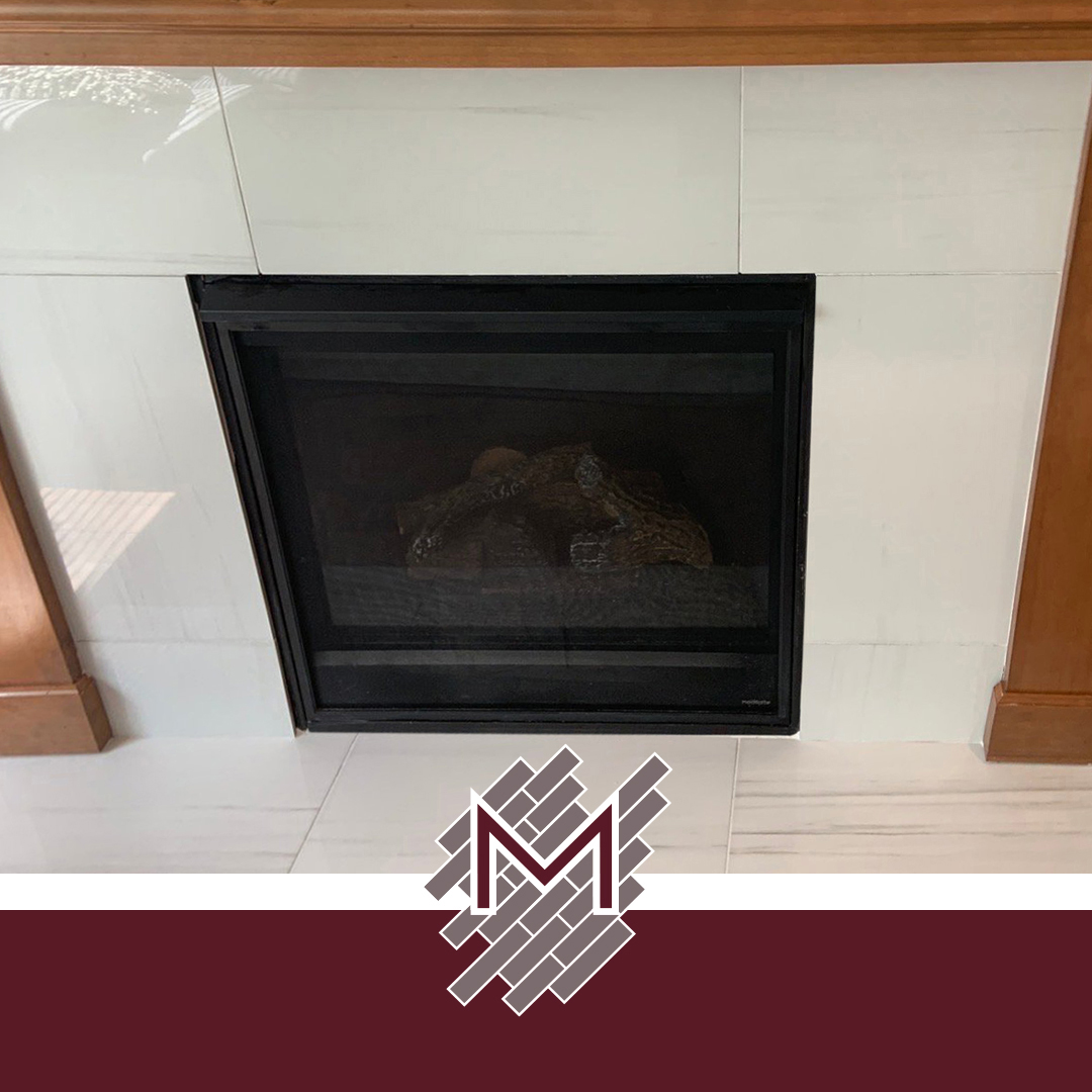 Herringbone backsplash tile and fireplace